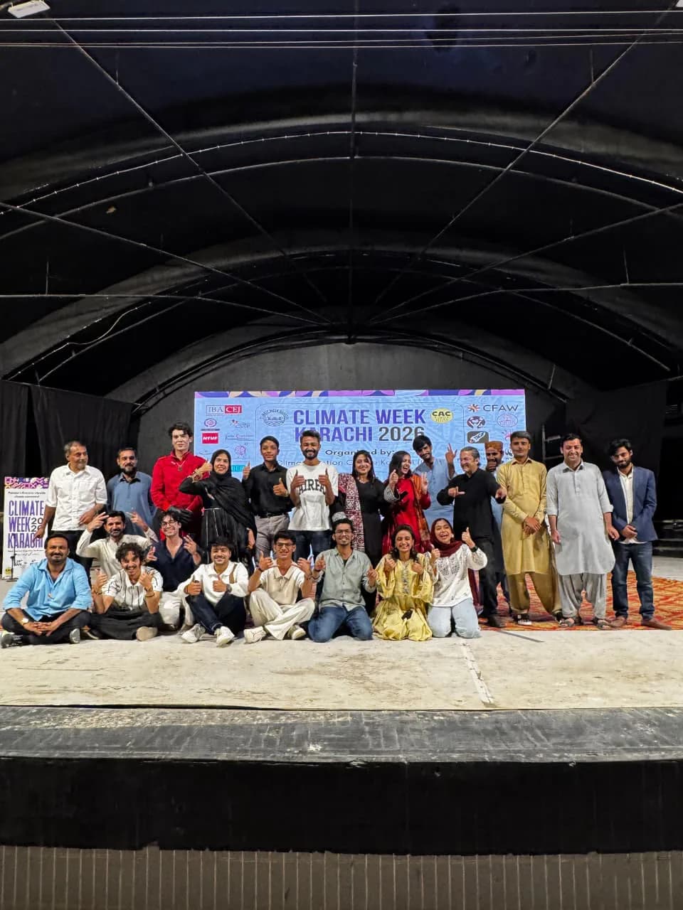 Organizers and participants together on stage at Climate Week Karachi