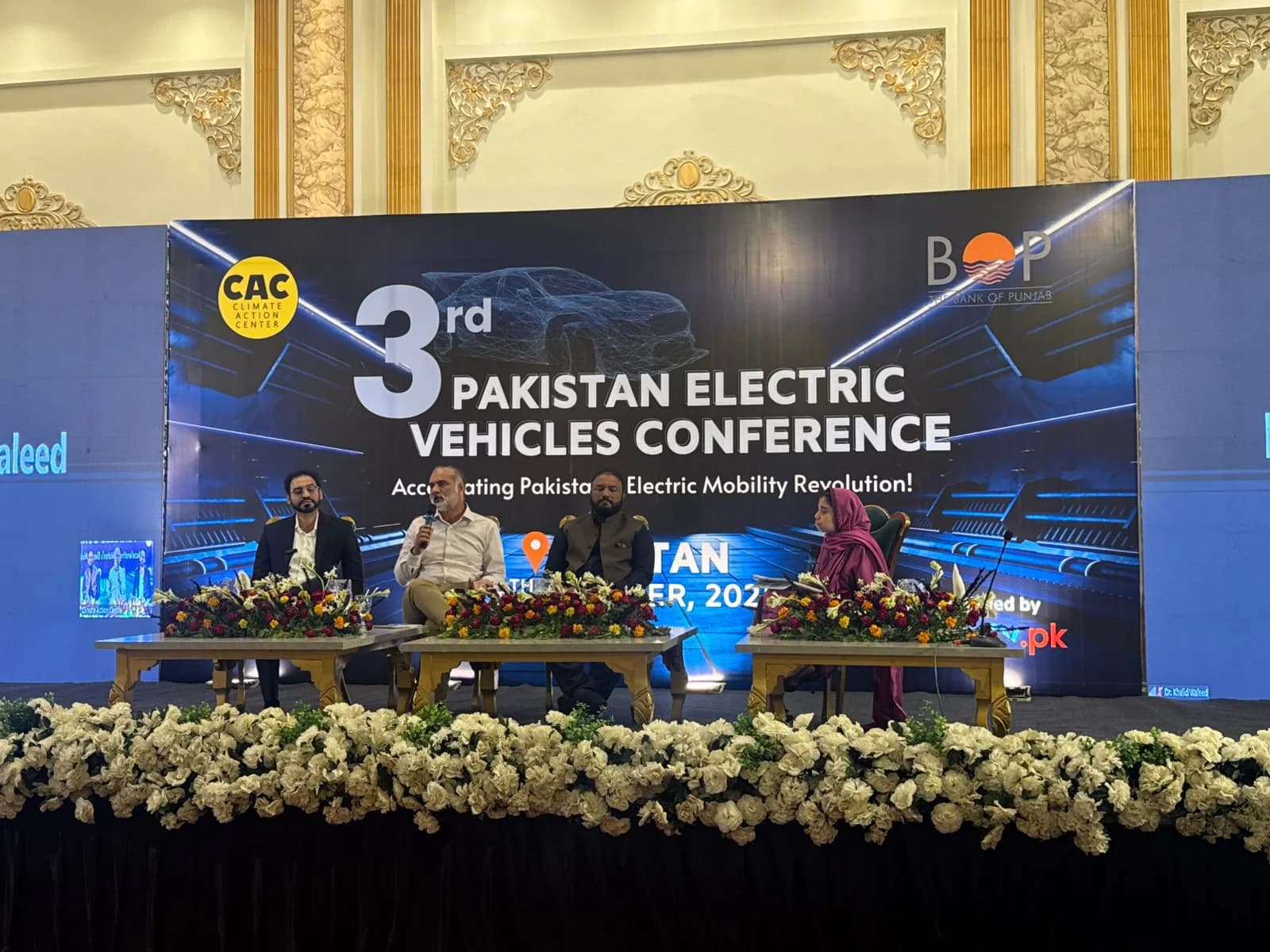 Speaker on stage at the Pakistan Electric Vehicles Conference